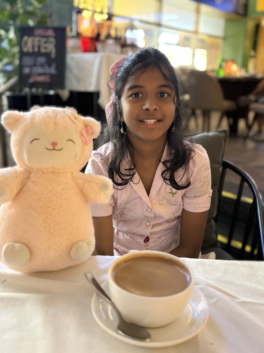 Anshika at a cafe
