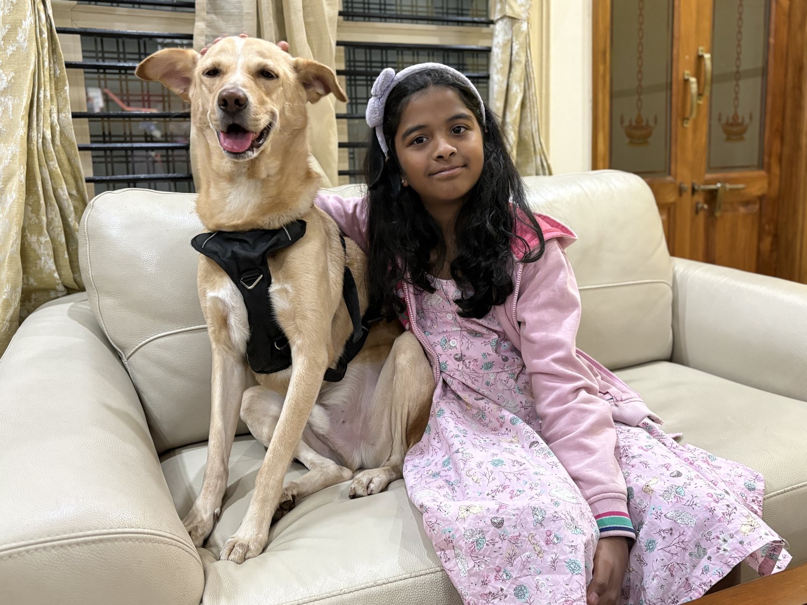 Anshika with a dog